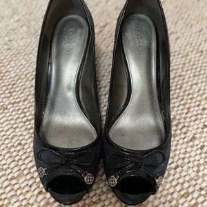 Women’s Coach black wedge size 9B